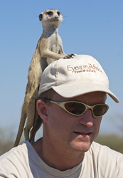 James Weis with a meerkat friend in Botswana