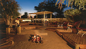 The Lodge's outdoor boma is used for evening meals under the stars