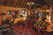 The main lounge is designed in warm Kalahari colors