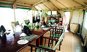 The lounge and dining area are under canvas