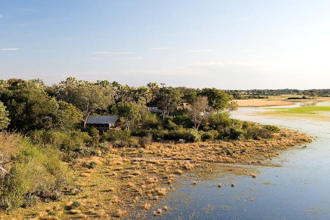 Tubu Tree camp and Okavango floodwater
