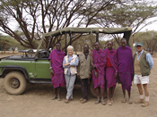 Safari vehicle and staff