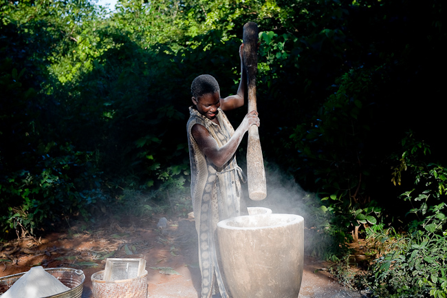 Pounding maize in the village