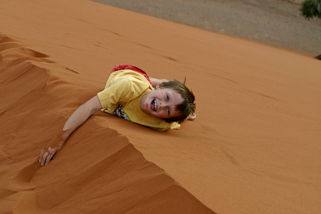 Rolling down a sand dune