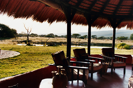 Lounge and swimming pool, Okonjima Camp, Namibia