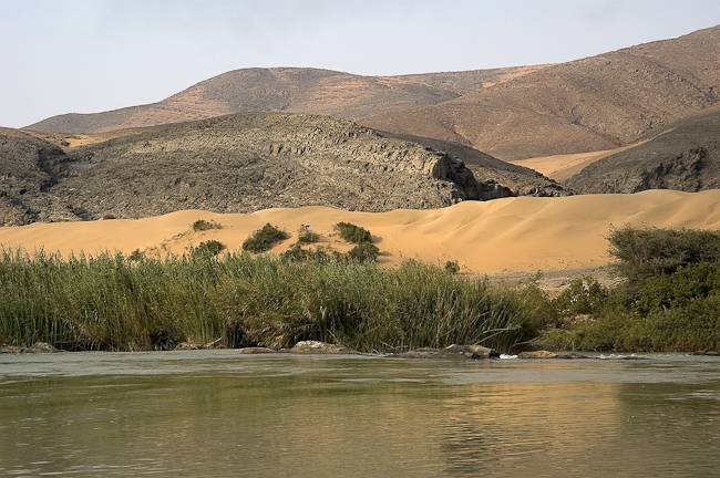 Kunene river and sand dunes