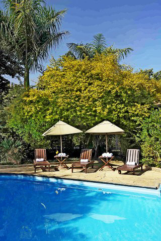 Pool area at Arusha Coffee Lodge