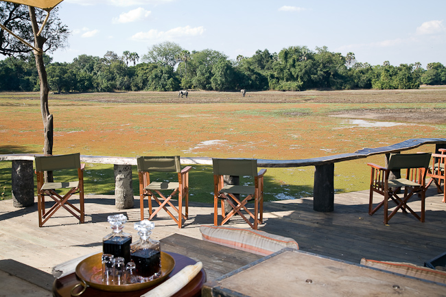 Main camp deck and elephants in the lagoon