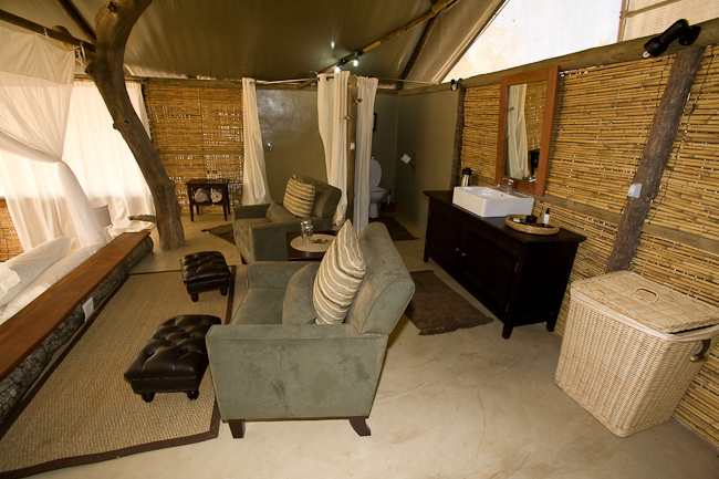 Guest tent lounge, vanity and bathroom area