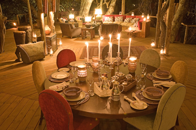 Dining table set for dinner