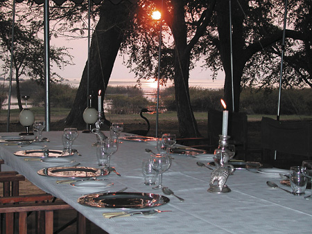 Dinner is by candlelight under the stars at Lechwe Plains