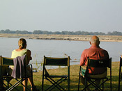 Guests enjoying the view of the river from Tafika Camp