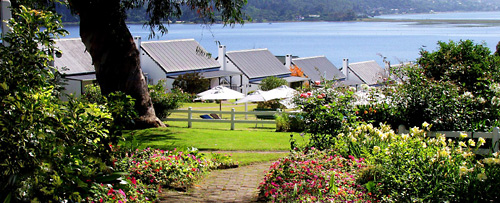 View of Belvidere Manor Hotel cottages and Knysna Lagoon