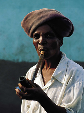 Xhosa Woman smoking a pipe, near Coffee Bay, Eastern Cape