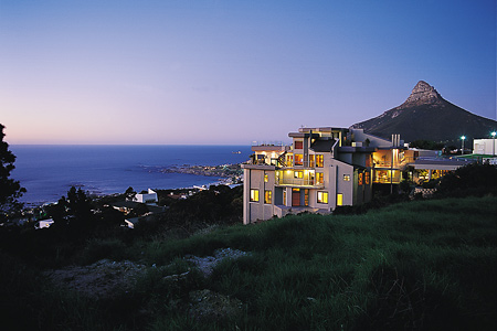 Evening view of Ezard House and Camps Bay 