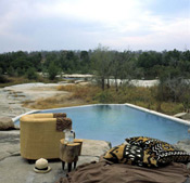 The pool overlooks the river