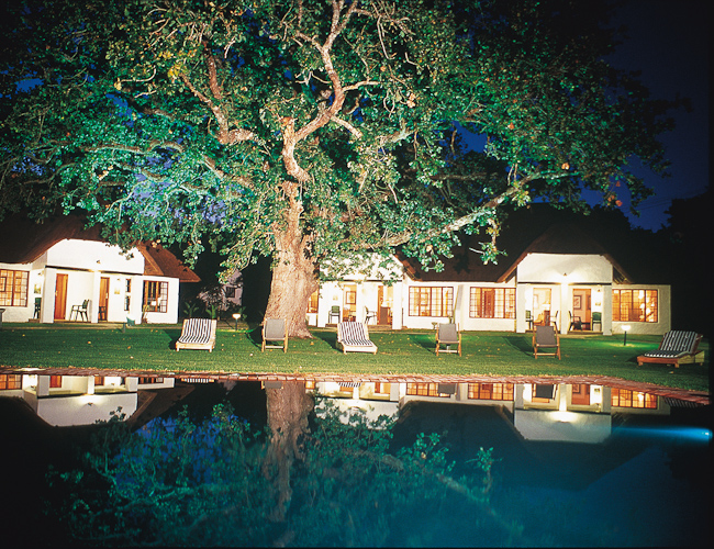 Pool and Garden Rooms at night