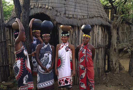Zulu Women outside the kraal (Umuzi)