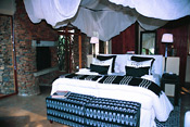 Guest bed, Makanyane Safari Lodge, Madikwe Reserve