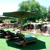 Lounge chairs and waterfall