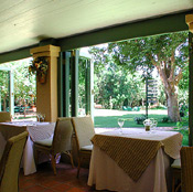 Dine with a lovely view on the verandah