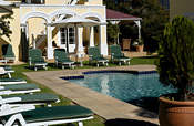 Swimming pool and loungers