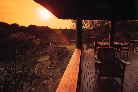 Lobegula's wooden deck overlooks the Shamwari bush