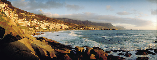 Clifton and the 12 Apostles with Table Mountain breaking through the clouds